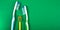 Family toothbrushes on a green background oral care caries prevention free space close-up
