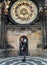 Family of Tourists on the Background of Tower Astronomical Clock, Prague