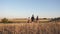 Family of tourists on journey. Dad with two daughters on a camping trip. children and father with backpacks are walking