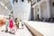 Family of tourists waking in streets Bari, Puglia, South Italy