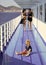 Family travelling on cruise ship, defocused. Family rest concept. Father, mother walk on deck of cruise liner while kid