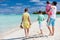 Family on a tropical beach vacation