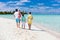 Family on a tropical beach vacation