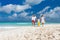 Family on a tropical beach vacation