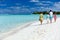 Family on a tropical beach vacation