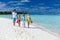 Family on a tropical beach vacation