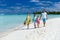 Family on a tropical beach vacation