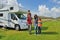 Family vacation, RV travel with kids, happy parents with children on holiday trip in motorhome