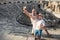 Family vacation selfie photo in antique amphitheater ruins in Si