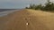 Family vacation in summer. Young asian family walking on beach. Big friendly family with three children