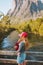 Family vacations mother and infant baby traveling in mountains