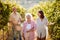 Family vineyard - mother and daughter on autumn vineyard