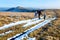 Family walk on autumn mountain plateau