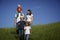 Family walking in field