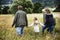 Family Walking Field Nature Togetherness Concept