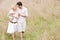 Family walking outdoors smiling