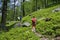 Family walking in a path in mountain