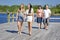 Family walking on viewing platform by the creek