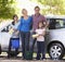 Family Washing Car Together