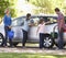 Family Washing Car Together