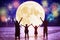 Family watching the moon and fireworks on the beach