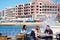 Family at a waterfront restaurant, Marsalforn, Gozo.