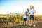 Family is where youll find the purest of love. Portrait of a happy family bonding together outdoors.