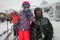 Family on winter vacations taking selfie on mountain slope