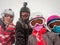 Family on winter vacations taking selfie on mountain slope