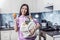 Family woman holding orange after buying fruits and vegetables