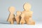family wooden figures as unity social values