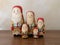 A Family of Wooden Santa Claus Nesting Dolls