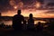 Family with young kids enjoying fireworks at night. Celebrating July 4th, Independence Day. New Years celebration