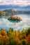 Famous alpine Bled lake Blejsko jezero in Slovenia, amazing autumn landscape. Scenic aerial view, outdoor travel background