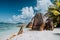 Famous Anse Source d'Argent beach on La Digue, Seychelles. Huge surreal shaped granite boulders on tropical shore