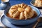 Famous Apple Dumpling served in a Blue Bowl
