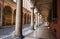 Famous arcade of Bologna. Via Zamboni. Unesco Heritage since 2021. Italy