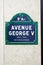 Famous Avenue George V street sign in Paris, France