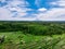 Famous Bali landmark Jatiluwih rice terraces. Beautiful view of green hills and mount Agung on horizon.Tourist destination-Bali.