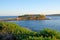 Famous Bare Island and its wooden footbridge in sunset light, Sydney Australia.