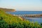 Famous Bare Island and its wooden footbridge in sunset light, Sydney Australia.