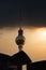 The famous Berlin TV tower behind a fountain on Berlin`s Alexanderplatz