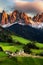 Famous best alpine place of the world, Santa Maddalena St Magdalena village with magical Dolomites mountains in background, Val