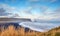 Famous Black Sand Beach Reynisfjara in Iceland, windy Morning,  ocean Waves, colorful Sky