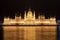 Famous Budapest parliament at the river Danube at night from the