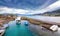 The famous canal of Elounda with the ruins of the old bridge and fishing boats, Crete.