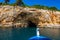 The famous caves of Votsi beach area in eastern Alonissos as seen during boating in Alonissos island, Greece
