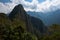 The famous and characteristic peak of Huayna Picchu seen from Machu Picchu