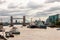 Famous cityscape view of London. Forecast Thames river traffic full of nautical ships with amazing Tower bridge on the background