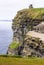 Famous cliffs of Moher with tower. Ireland